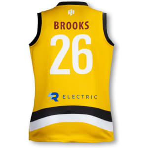 A yellow women's AFL jersey featuring black and white stripes, with a logo and the number 26.