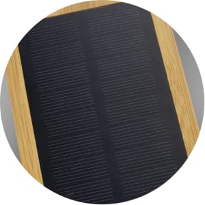 A bamboo solar power bank featuring a black solar panel surface and a natural bamboo frame.