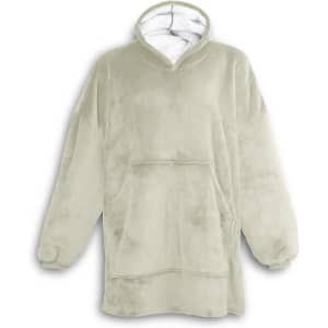 A soft, light green blanket hoodie featuring a large front pocket and a cosy, lined hood. It has a branding logo.