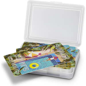 A gift case containing a set of colourful playing cards featuring a vibrant poolside design.