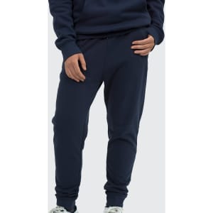 Unisex navy sweatpants with a fitted design and side pockets, paired with a matching hoodie.