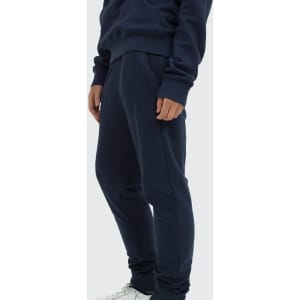 Navy unisex sweatpants with a relaxed fit, featuring an elastic waistband and a logo. Ideal for casual wear.
