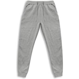A pair of grey unisex sweatpants with an elastic waistband and pockets. Includes a logo on the waistband.