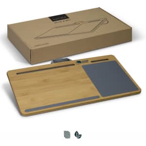 A bamboo lap desk with a grey writing surface and a boxed package featuring a logo.