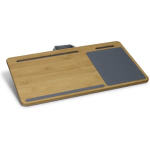 A bamboo lap desk with a grey silicone surface and adjustable strap for easy handling. It features sleek, natural wood.