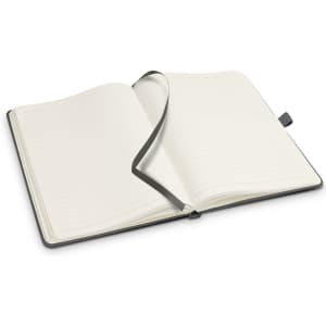 An open Petros Stone Paper Notebook in black, featuring lined pages and a matching ribbon bookmark.