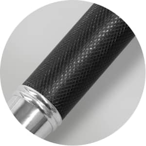 A metal pen with a textured black grip and a shiny silver tip, featuring a logo.