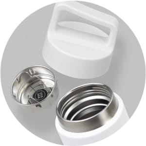 A drink bottle with a white exterior, featuring a handle and a stainless steel interior with a removable filter.
