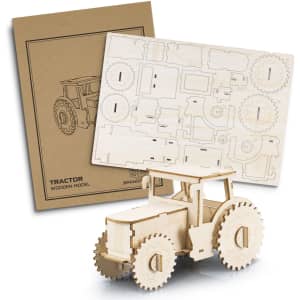 A wooden tractor model in natural wood colour, with a laser-cut template and packaging design.