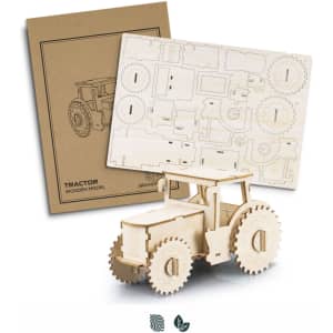 A wooden tractor model in natural colour, with assembly parts displayed on a cardboard backing.