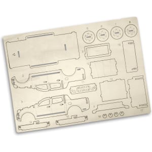 A wooden model kit featuring laser-cut pieces of a UTE in a light colour. Includes body and details for assembly.
