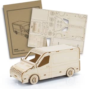 A wooden model of a van in natural wood colour, accompanied by instructional sheets and design templates.