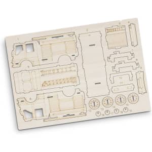 A wooden model kit featuring various parts of a fire truck, in natural wood colour, with detailed cutouts.