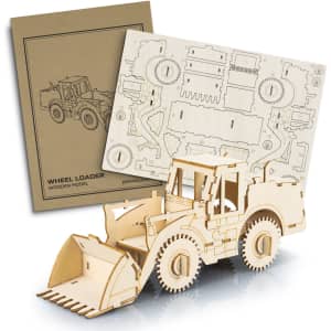 A wooden model of a wheel loader in natural wood colour, featuring detailed parts and packaging for assembly.