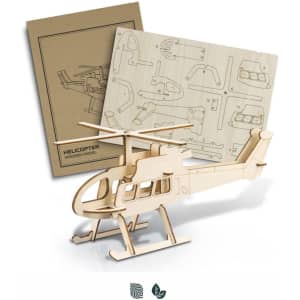 A wooden helicopter model in natural wood tone, alongside a detailed assembly template. Includes branding.