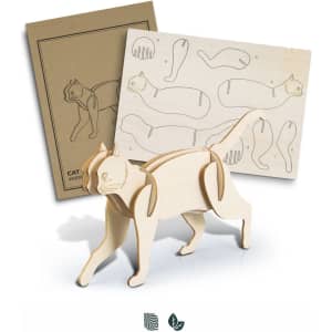 A wooden model of a cat in a natural finish, alongside instruction sheets for assembly.