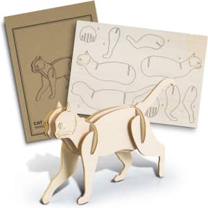 A wooden model of a cat in a natural finish, accompanied by a diagram sheet for assembly.