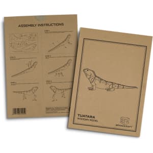 A brown cardboard packaging featuring assembly instructions and an illustration of a Tuatara wooden model.