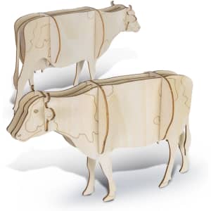 Two intricately cut wooden cow models in a natural wood colour, showcasing a three-dimensional design.