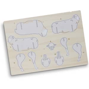 A wooden model kit featuring sheep-shaped pieces, with outlines for assembly, in a natural wood colour.
