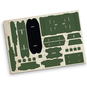 A wooden model kit featuring various green and black pieces for assembly, presented on a light wood base.