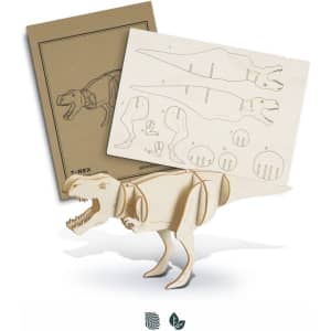 A wooden model of a Tyrannosaurus Rex, featuring unassembled parts on a backing template. The model is light coloured.