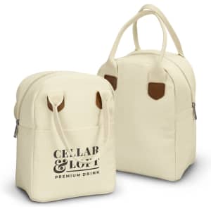 A cream lunch bag with a logo, featuring two handles and faux leather accents.