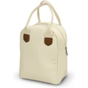 A cream-coloured lunch bag with brown leather accents and dual handles. It features a zippered top and a side pocket.