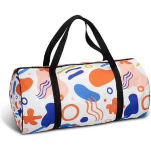 A colourful duffle bag featuring abstract shapes in orange, blue, and pink, with black handles. It has a logo.