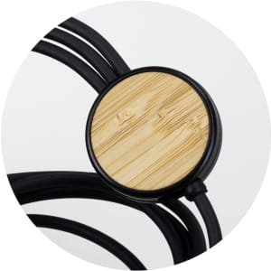 A charging cable featuring three connectors with a black design and a round bamboo accent.