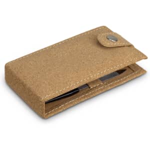 A cork manicure set in a tan case, featuring tools within, secured by a snap closure. The case is embossed with a logo.