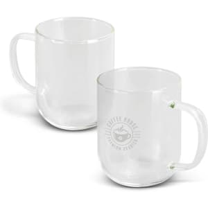 A glass mug in clear colour with a handle and a logo on one side. Two mugs are displayed.