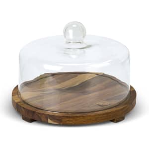A clear glass cake display dome with a wooden base, featuring a round shape and a glass knob on top.