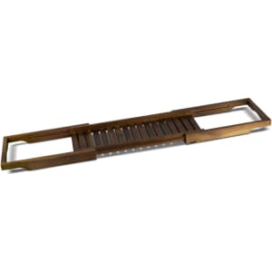 A wooden bath caddy in a natural brown hue with slatted design and cut-out handles.