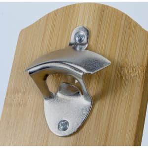 A drink bottle opener featuring a metallic opener mounted on a natural bamboo background. It has a logo.