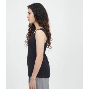 A black women's sports tank top with thin straps, featuring a relaxed fit and an understated design.