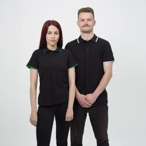 A black polo shirt for men featuring a contrasting collar, displayed by a model. The shirt has a logo.