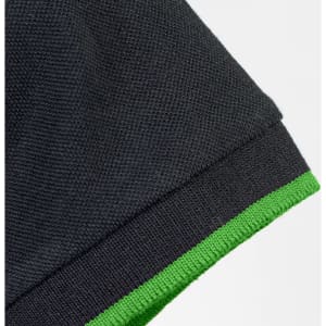 A black polo shirt featuring a green trim on the collar and sleeves, with a logo present.