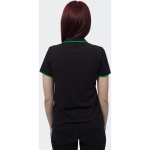 A women's black polo shirt featuring green trim on the collar and sleeves. The shirt has a logo on the front.