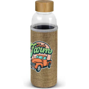 A drink bottle with a clear body, bamboo lid, and a natural fabric sleeve featuring a truck design.
