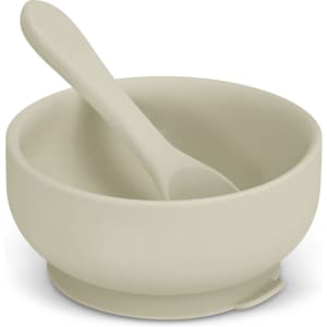 A suction bowl set featuring a soft green bowl and matching spoon, designed for kids. Includes a branding logo.