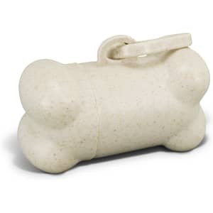 A bone-shaped pet bag dispenser in a natural beige colour, with a simple opening mechanism and a logo.
