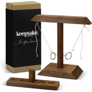 A wooden ring toss game set with a stand and five rings, displayed with a black and brown box featuring a logo.