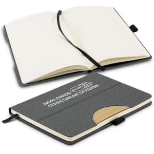 A grey notebook with a textured cover, featuring a logo, an elastic band, and lined pages inside.