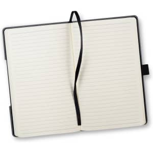 An open Atoll Notebook featuring lined pages, a black cover, and a black ribbon marker.