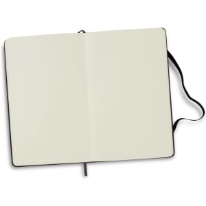 A blank Moleskine sketchbook with black cover, featuring a ribbon bookmark and elastic closure.