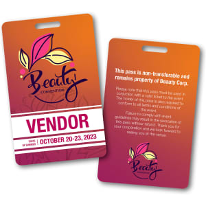 Two ID cards with a vibrant orange and pink gradient, featuring a floral design and a logo, along with event details.