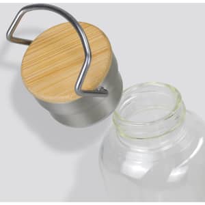 A drink bottle with a transparent glass body, topped with a rounded bamboo and metal lid, featuring a handle.