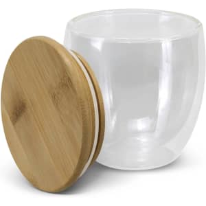 A drink cup made of clear glass with a bamboo lid, featuring a smooth, rounded design.
