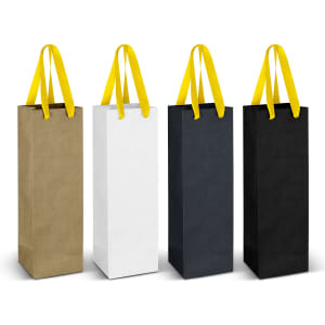 A set of four wine ribbon handle paper bags in gold, white, black, and dark green, featuring yellow handles.